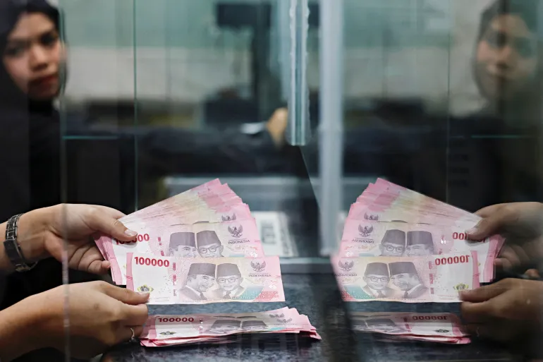 Indonesia’s rupiah falls to record low against US dollar