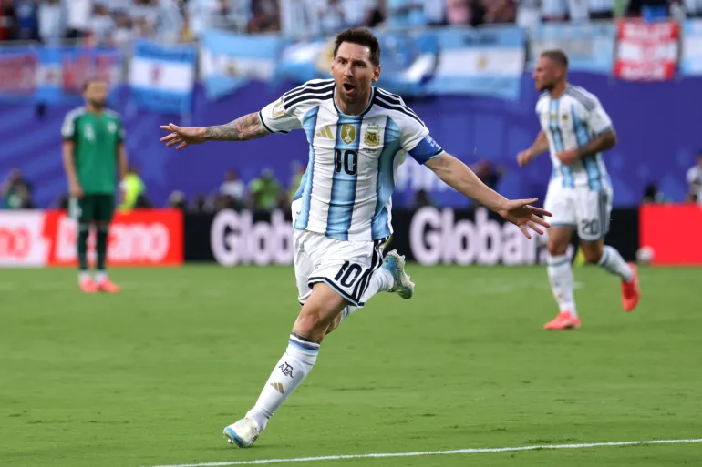 Messi hat-trick fires holders Argentina to win over Algeria at World Cup