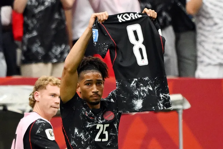 Canada Dominates Qatar 6-0 in World Cup Match Marked by Injury and Red Cards