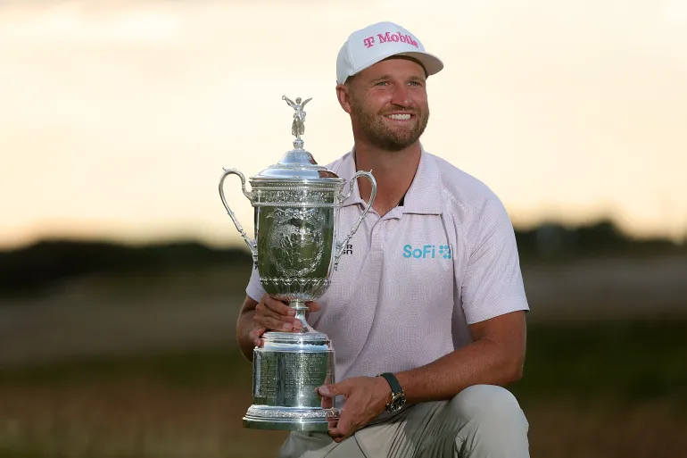 Golf: Clark wins US Open despite hecklers but hopes not to be ‘heel of PGA’