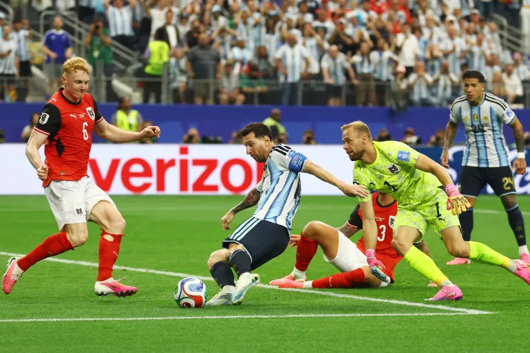 Messi grabs brace to make World Cup history and send Argentina into last 16