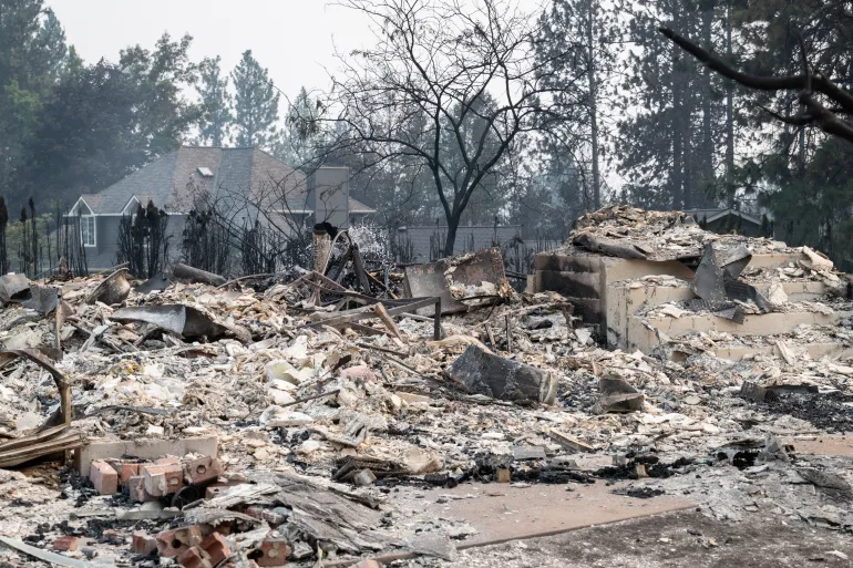 US arrests suspect over Spokane wildfire as tens of thousands flee blaze