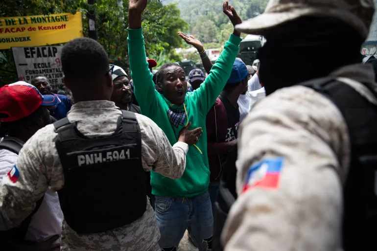 Haiti police confront public frustration after deadly gang attack kills 47