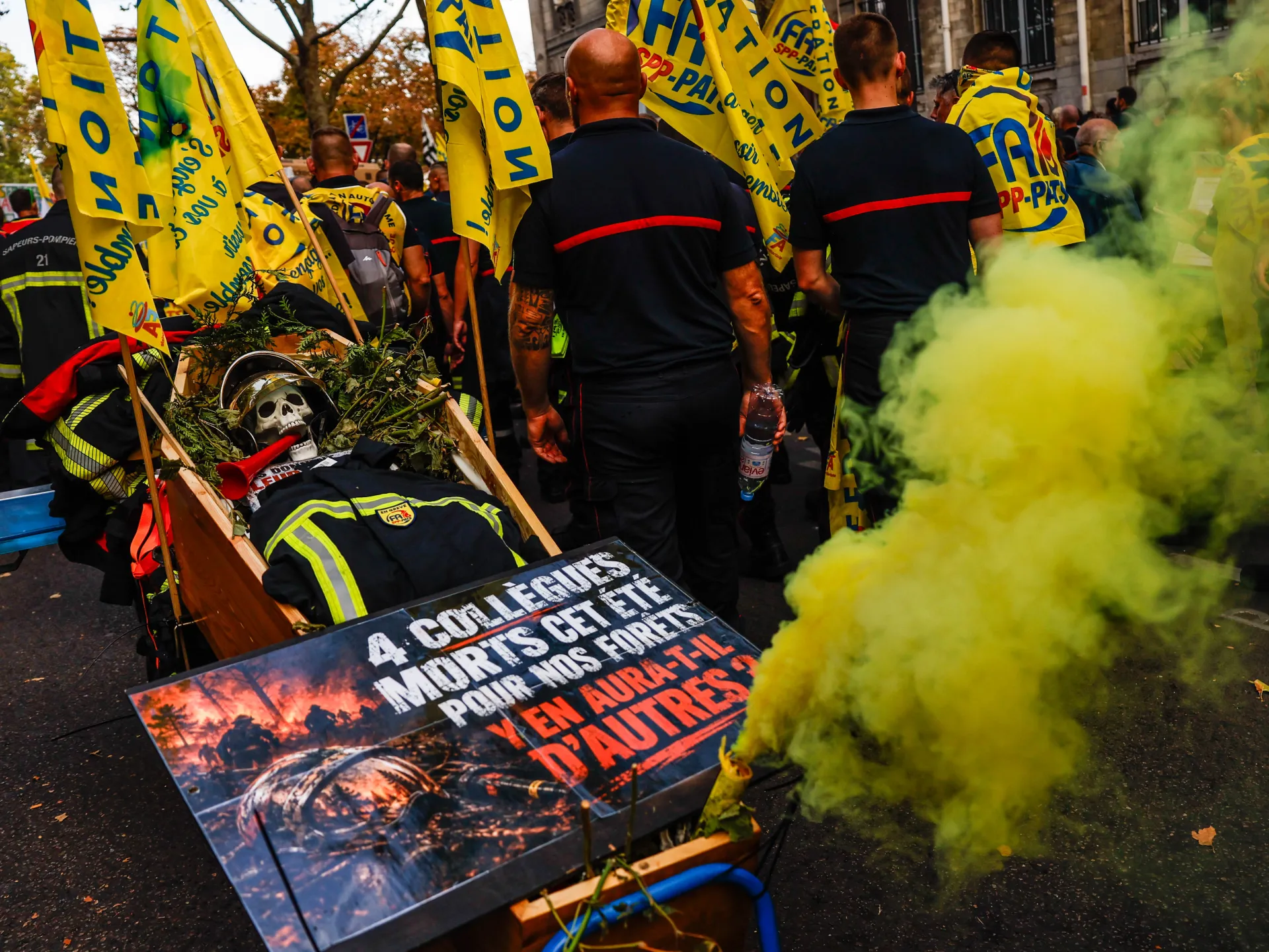 Public workers in France strike over pay as student protests turn violent