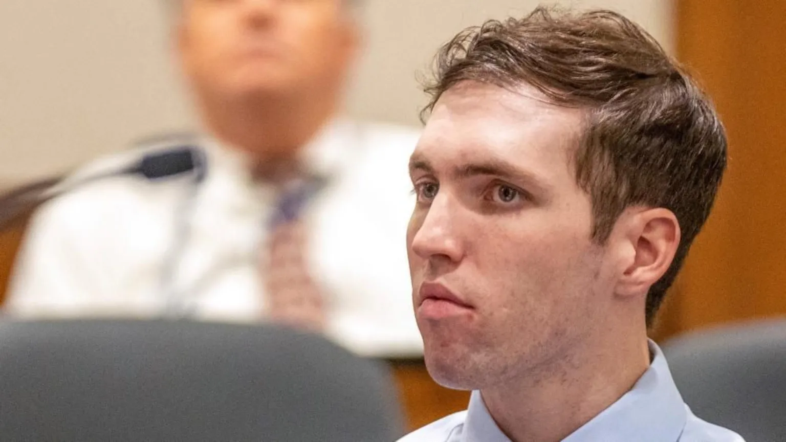 New footage shown at Kirk hearing shows man on rooftop near shooting scene
