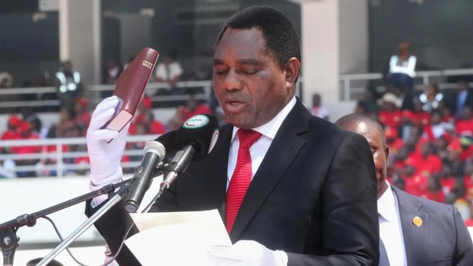Zambia's president sworn in for second term while opponent detained