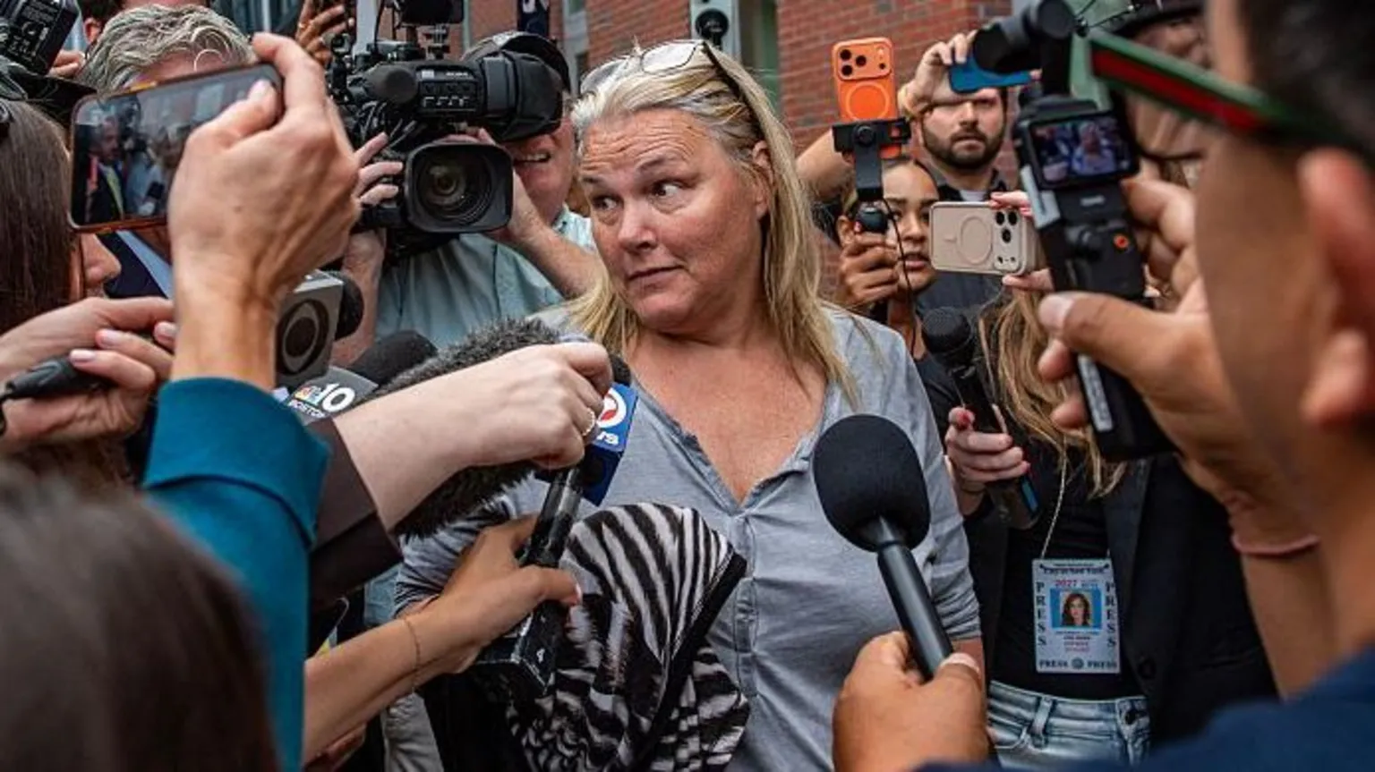 Woman charged with juror intimidation in Lindsay Clancy trial