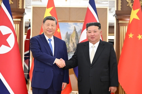 Xi, Kim Pledge Closer China-North Korea Ties During Pyongyang Meeting