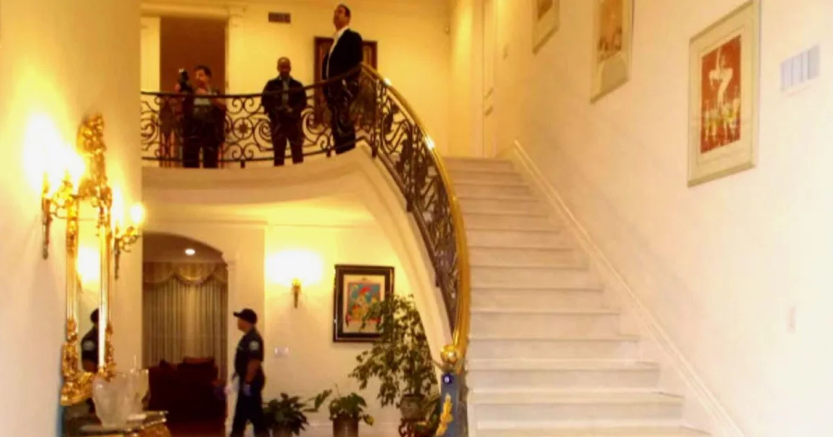 How did a wealthy widow wind up dead below a staircase in her mansion?