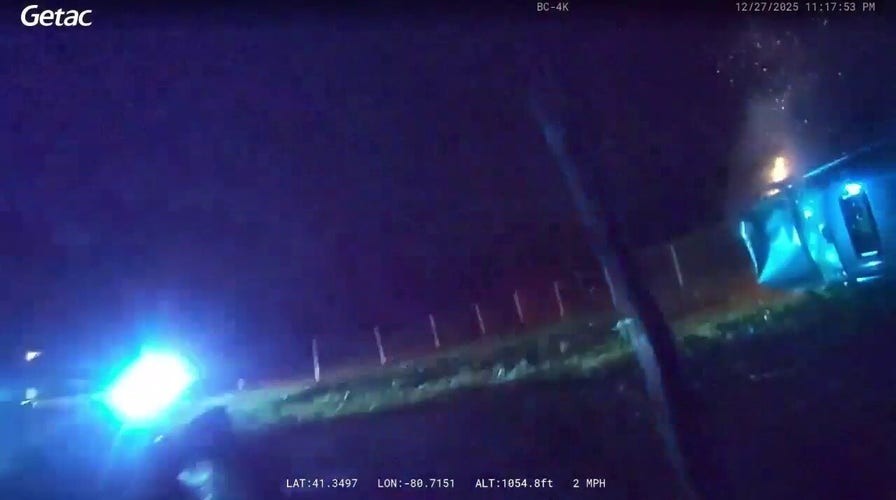 Ohio officers rescue injured driver from burning car after rollover crash