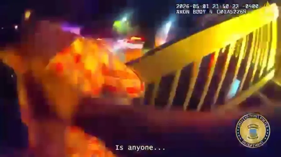 Officer grabbed 4-year-old and ran down flaming stairs, bodycam shows