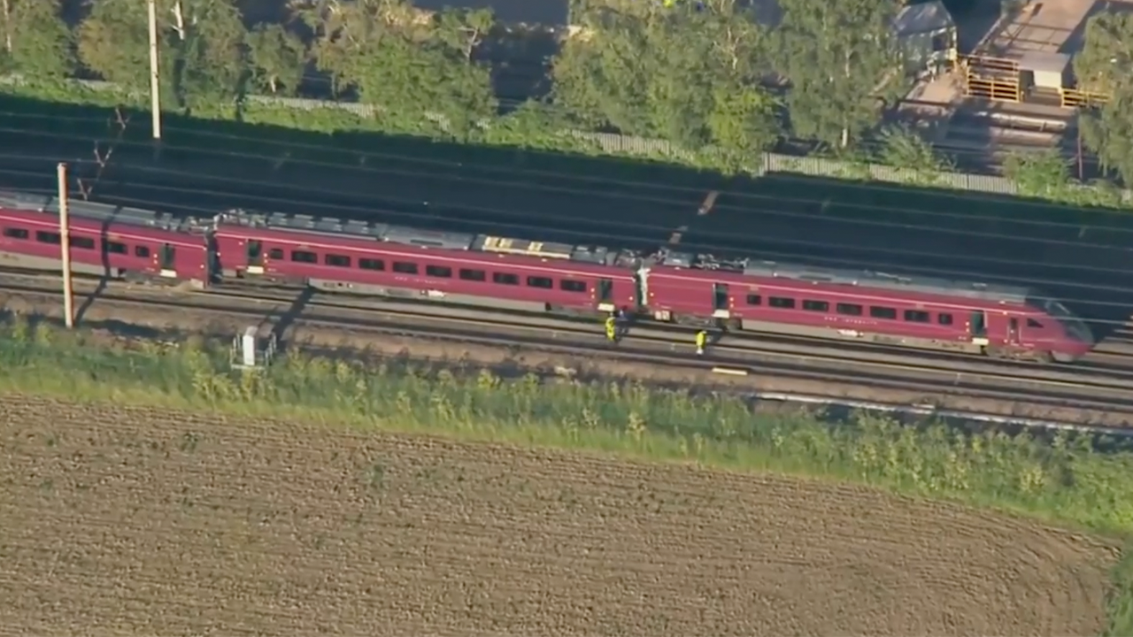 Two-train crash leaves at least 1 dead, 89 injured as emergency crews rush to chaotic scene