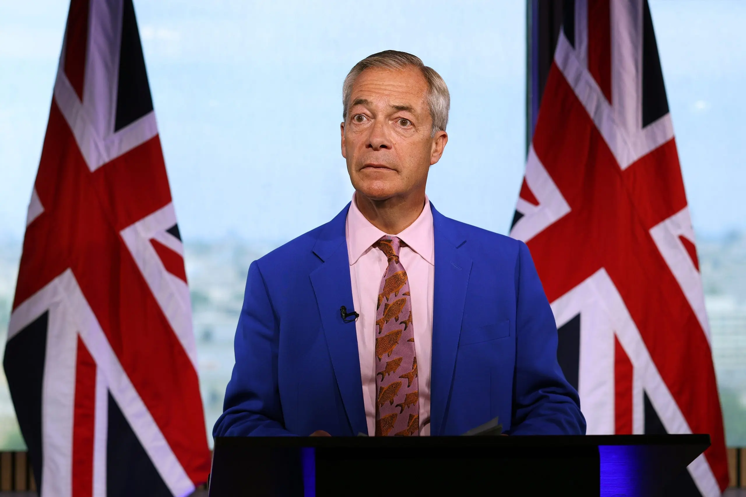 UK man charged with planning terrorism against Nigel Farage also accused of murdering politician