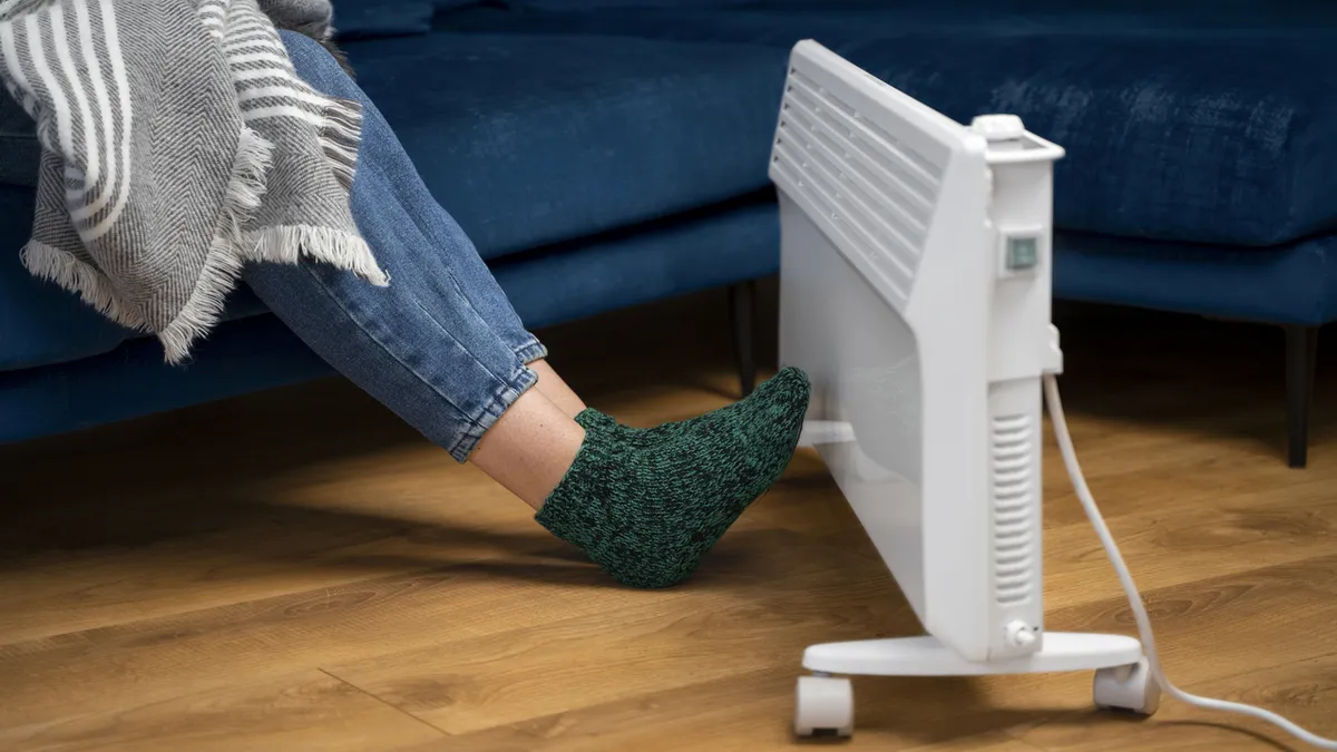 What is cheaper for heating the home: air conditioning, fan heater, electric heater, or panel?