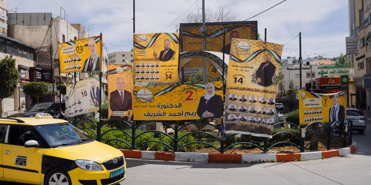 West Bank holds municipal elections under tight control of Palestinian Authority and Israel