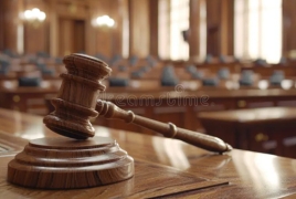 Court convicts ex-MFA employee on revised charge