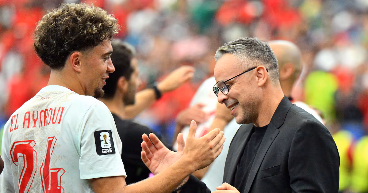 Morocco's head coach Mohamed Ouahbi (R) reacts with Neil El Aynaoui of Morocco after the FIFA World Cup 2026 Round of 16 match Canada against Morocco, in Houston, USA, 04 July