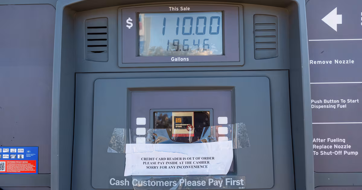 A petrol pump displays the price at a Chevron service station in California. Bloomberg