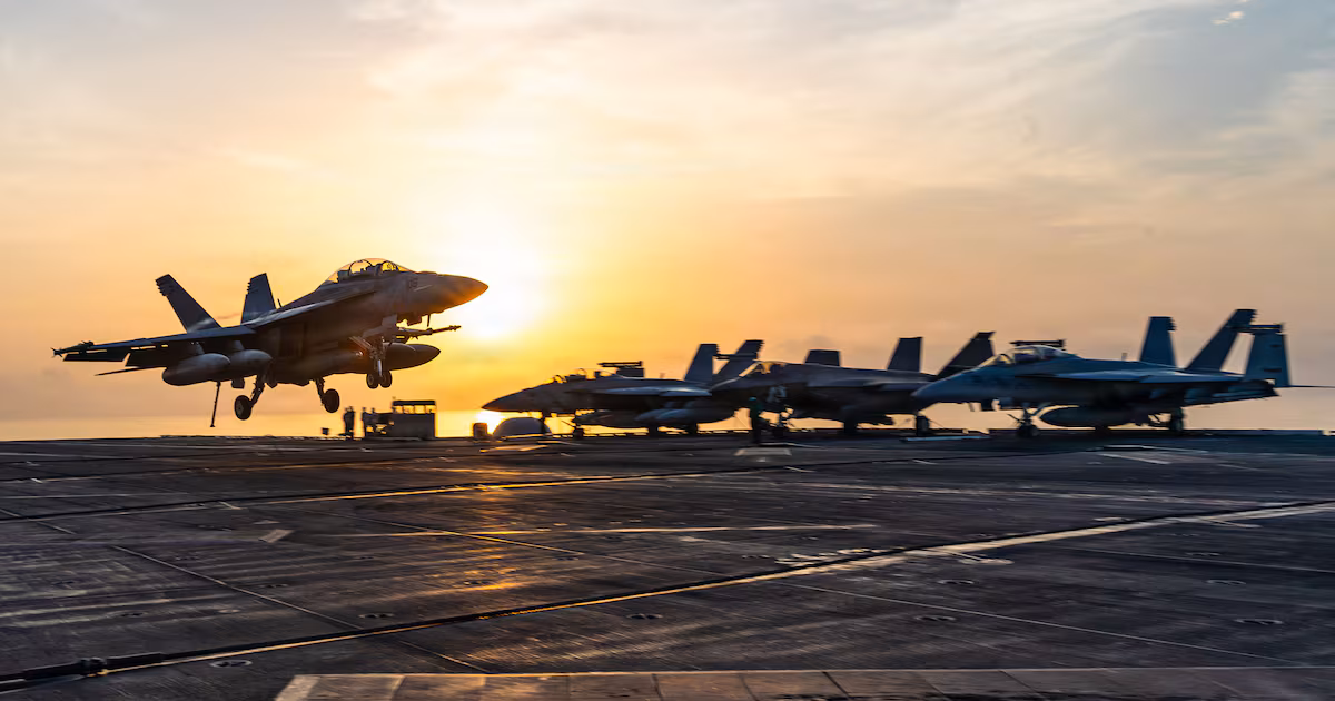 US Navy F/A-18 Super Hornet lands aboard Nimitz-class aircraft carrier
