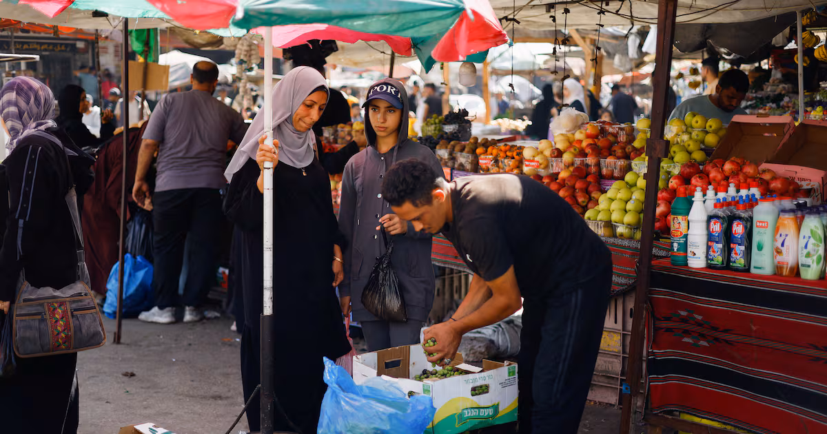 Israel says entry of commercial goods into Gaza halted amid dispute between traders and Hamas