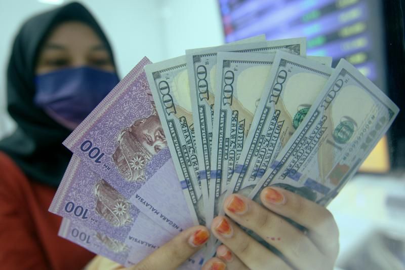 Ringgit softer against US$, firmer versus other currencies