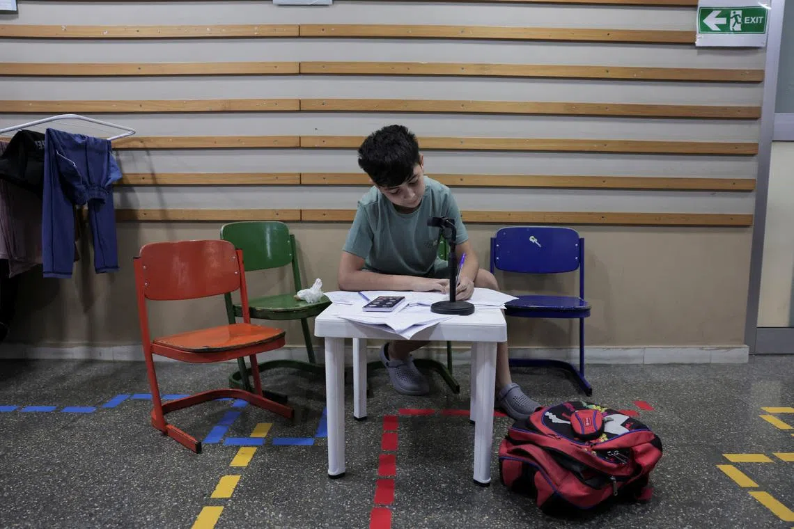 Beirut school converted to wartime shelter becomes flashpoint for societal tensions