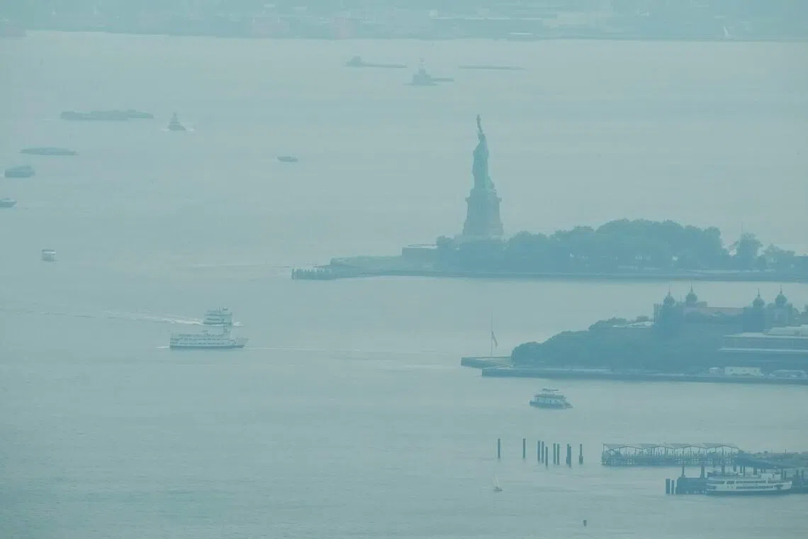 Canadian wildfire smoke chokes Toronto and turns sky orange, threatens US cities including New York