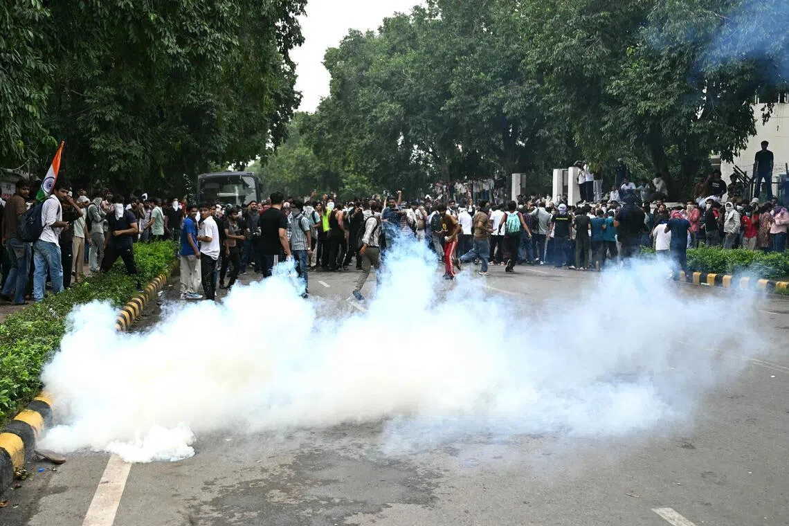 India’s ‘cockroach’ protest turns violent as police stop frustrated youth marching to Parliament