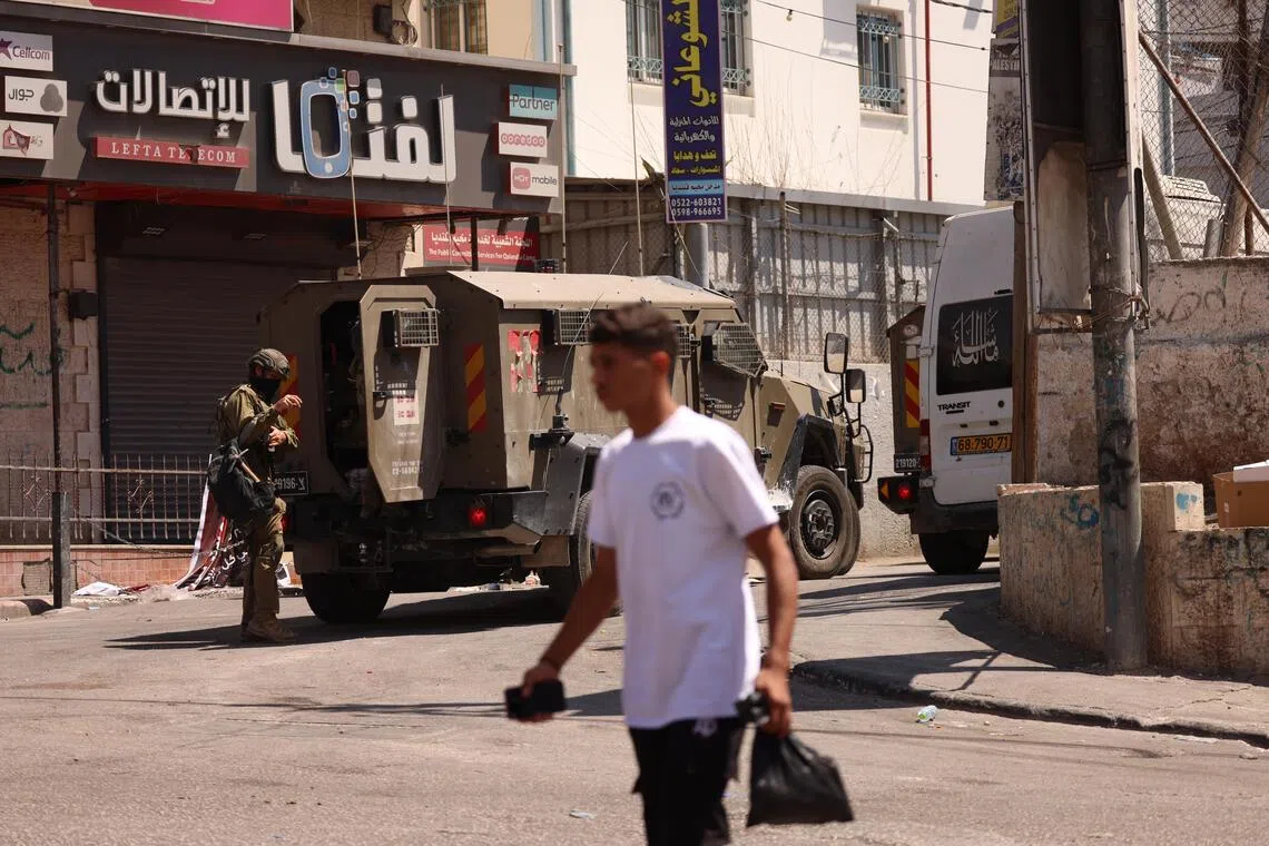 Israeli settlers attack West Bank Palestinian community, burn homes
