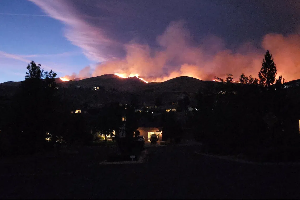 Tens of thousands ordered to evacuate as fire threatens US state of Nevada