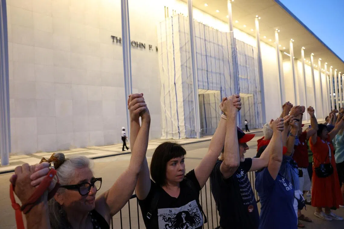 Protesters form human chain at Kennedy Center in US after Trump threat