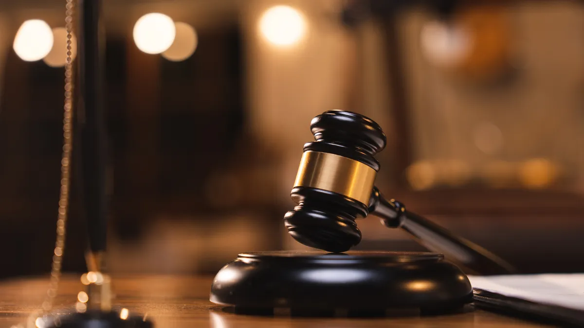 Janitor charged after allegedly taking photos of women in locker room
