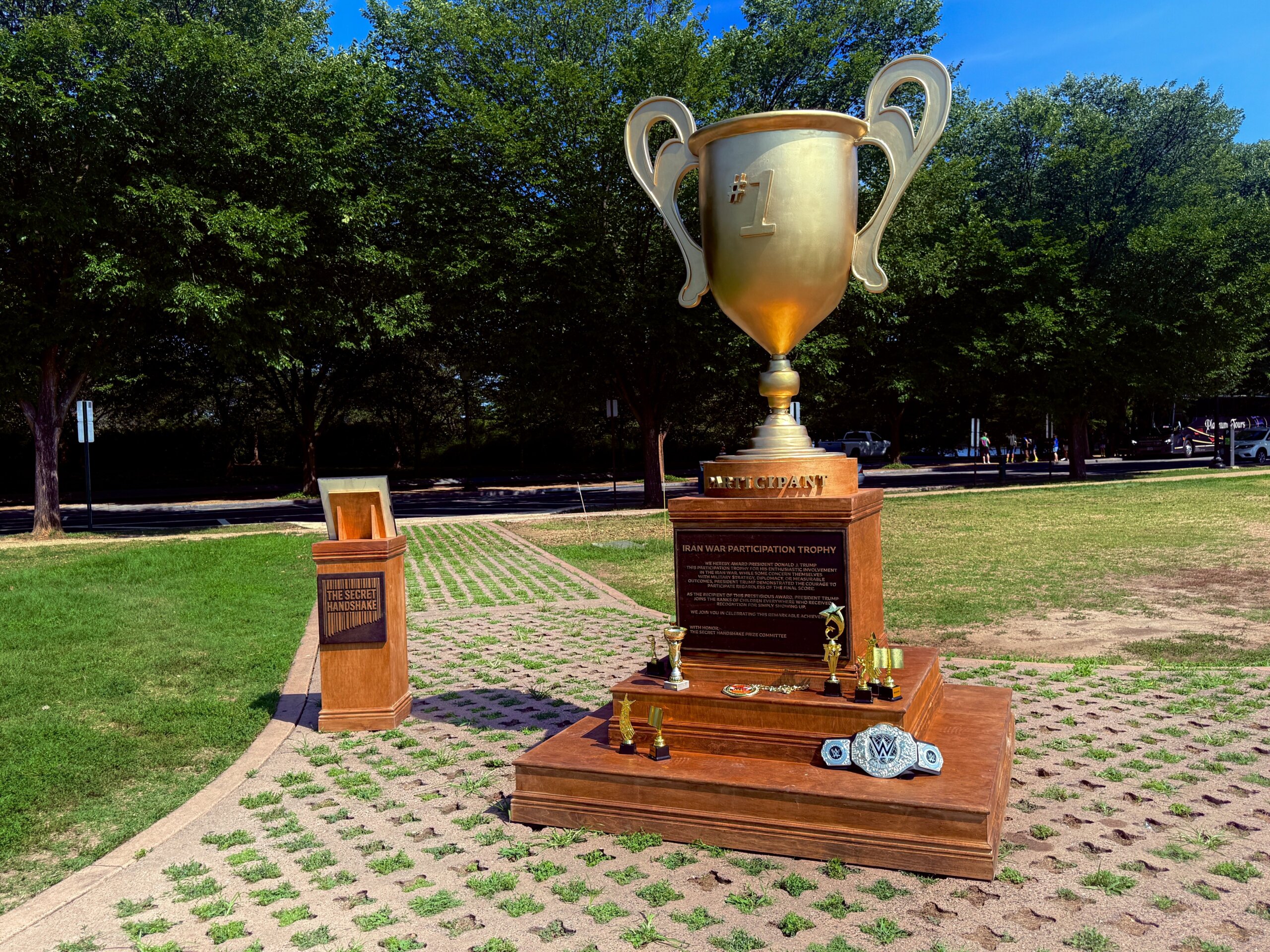 New protest art mocks Trump with a 10-foot ‘Iran War Participation Trophy’