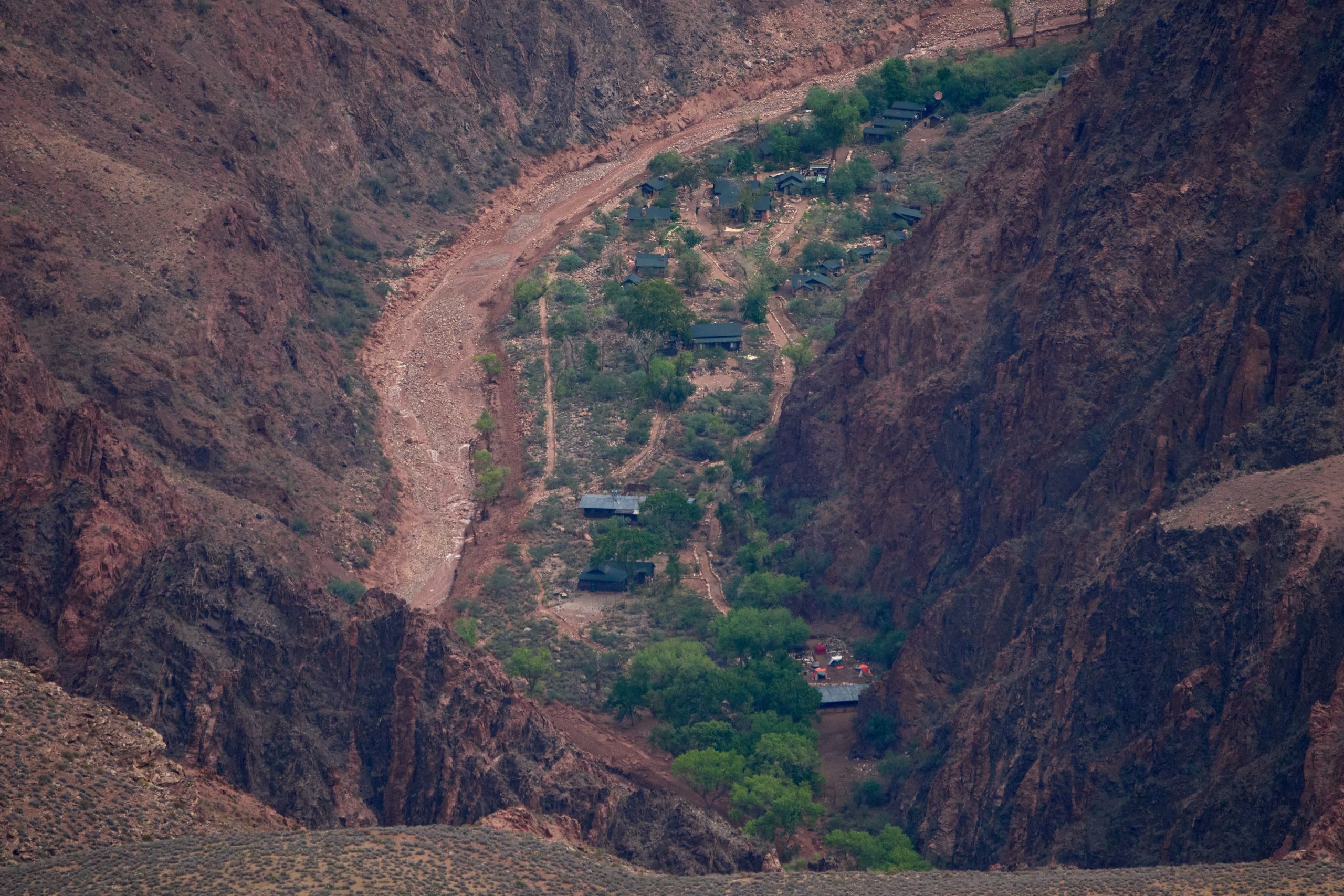 Rescuers saved some 80 people in Grand Canyon floods that left 2 dead and 1 missing, officials say