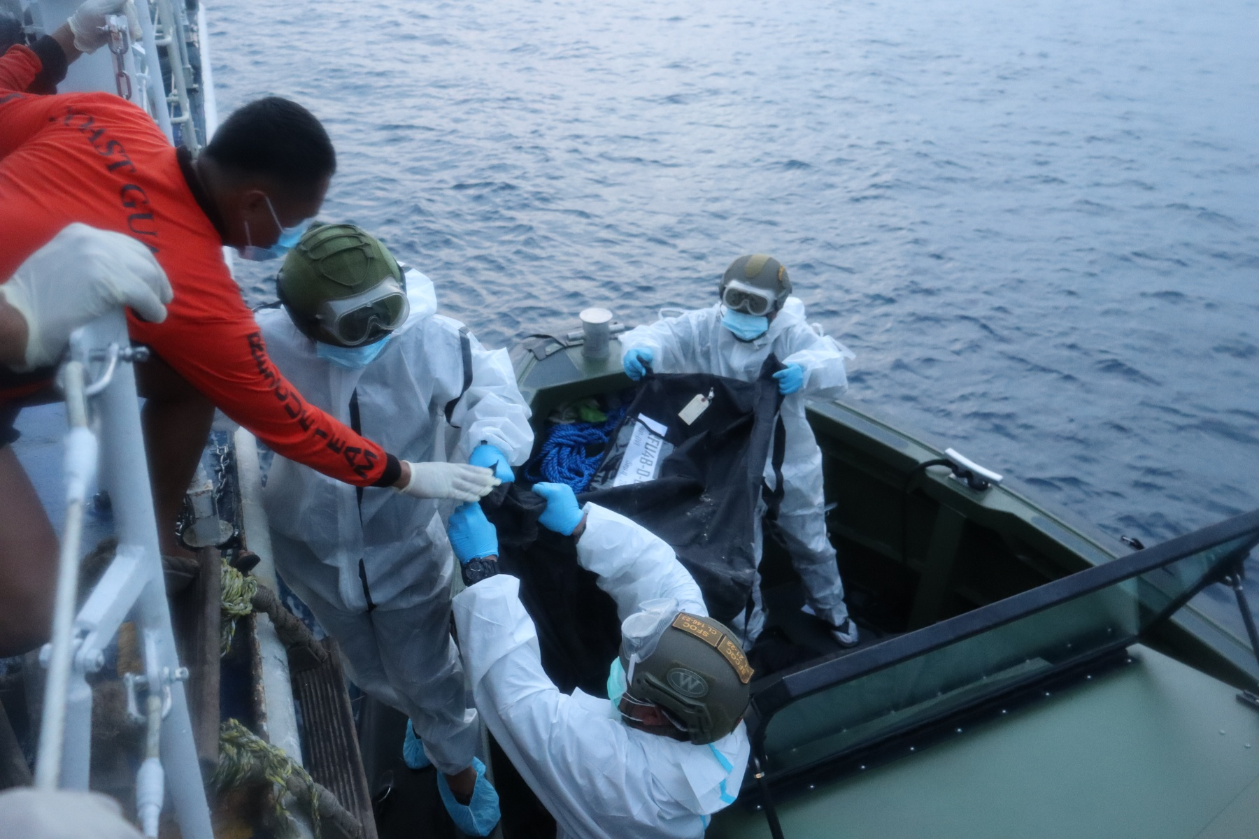 Rescuers pull more bodies from burned Philippine ferry as death toll hits 76