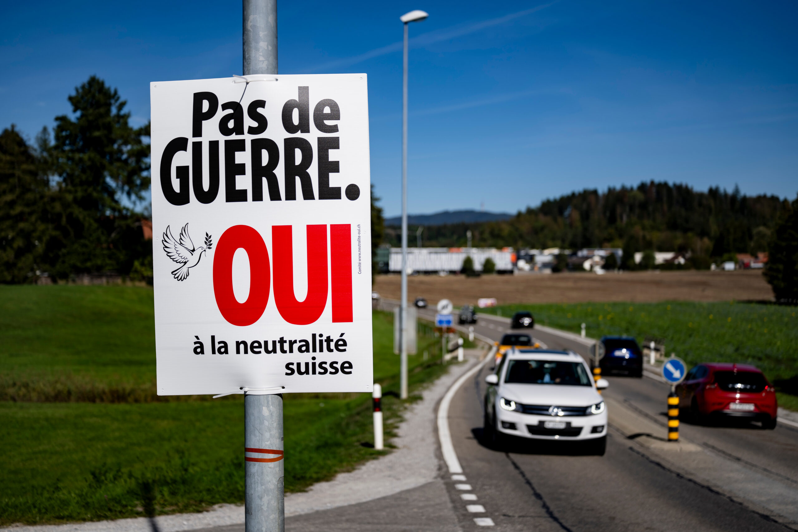Voters in Switzerland decide on right-wing party's proposal to tighten neutrality rules