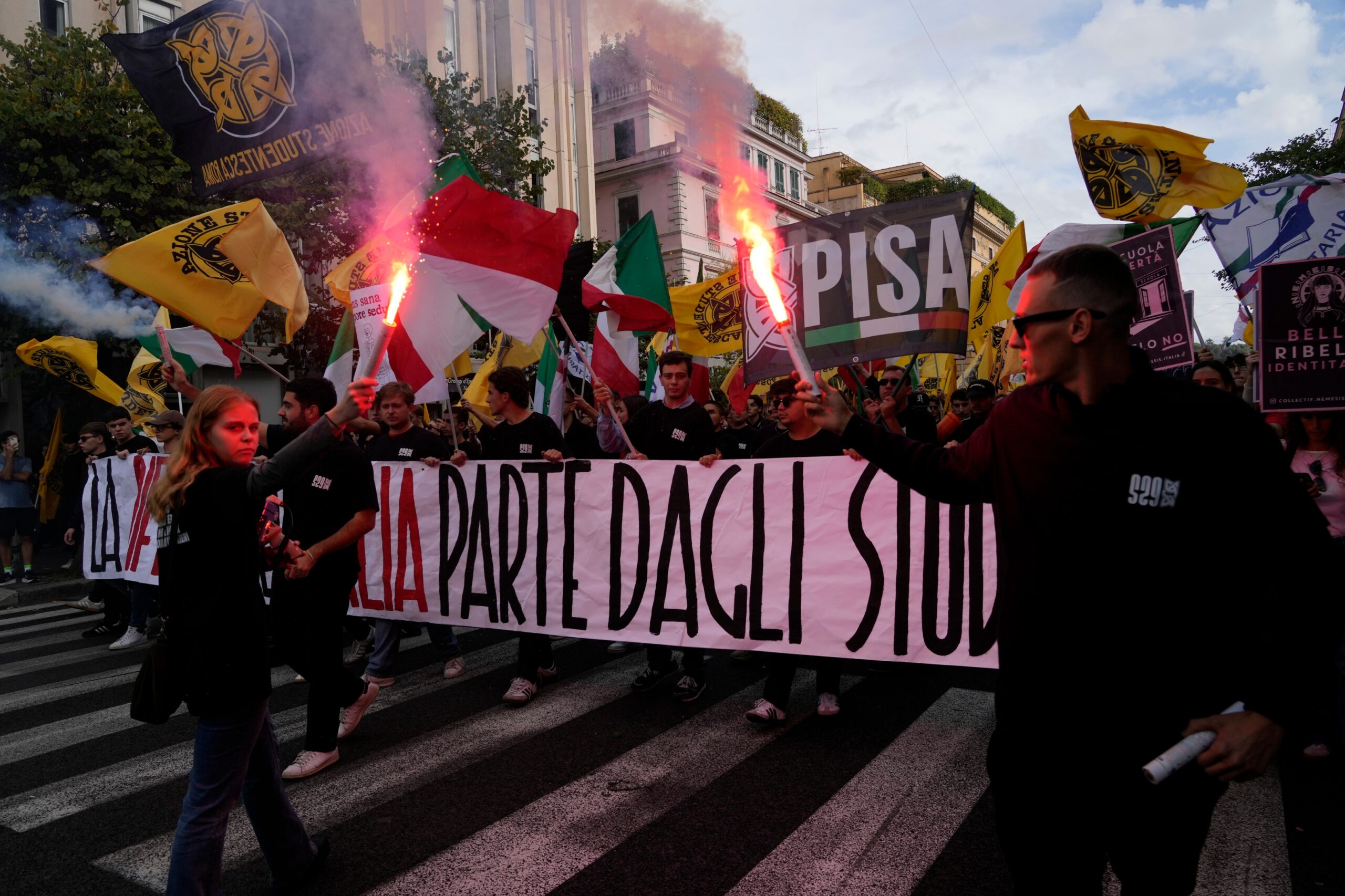 Soldiers guard center of Milan as thousands of protesters march in cities across Europe