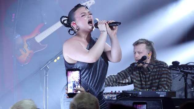 Lola Young performs at Elton John's Oscar party as he gifts her with 'protection' ring