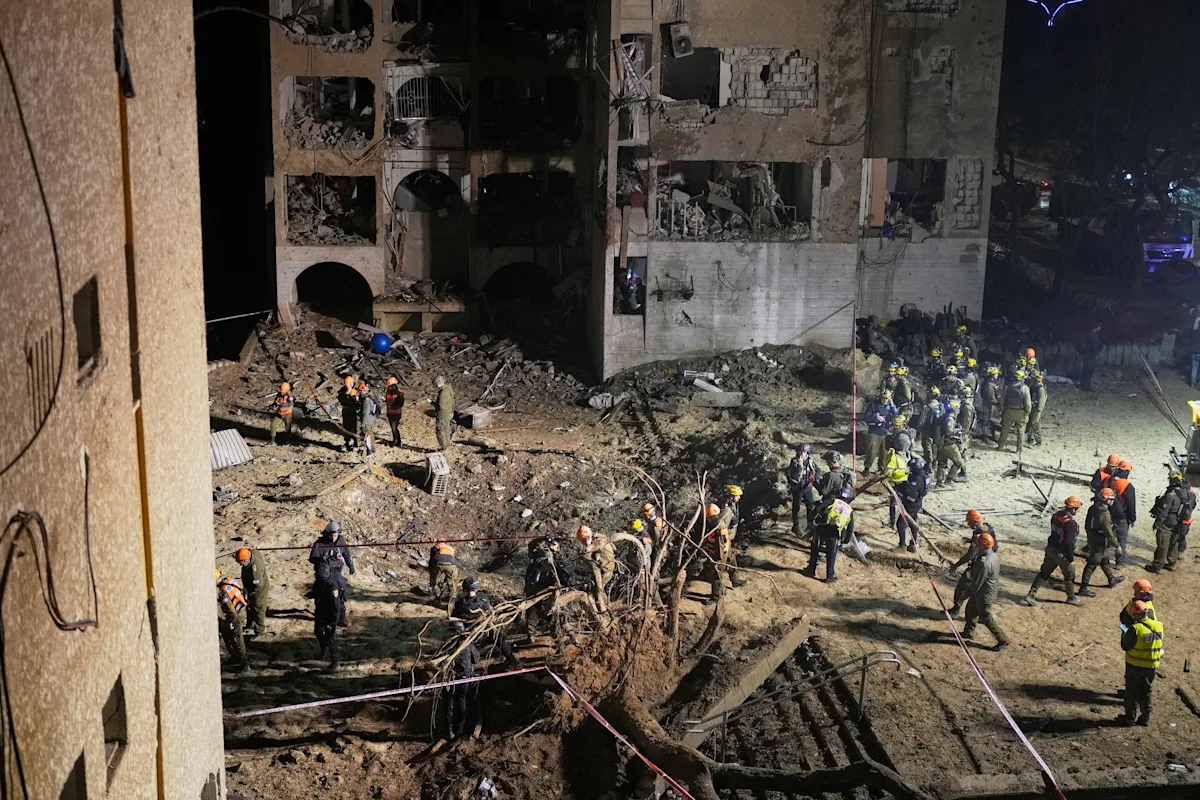 Iranian strikes on towns near Israel's main nuclear research center injure over 100