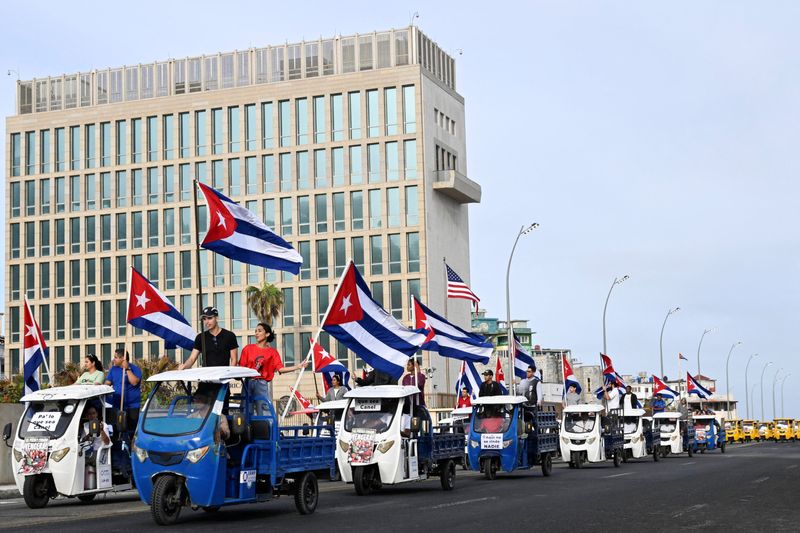 Cubans take to bikes and electric tricycles to protest US sanctions