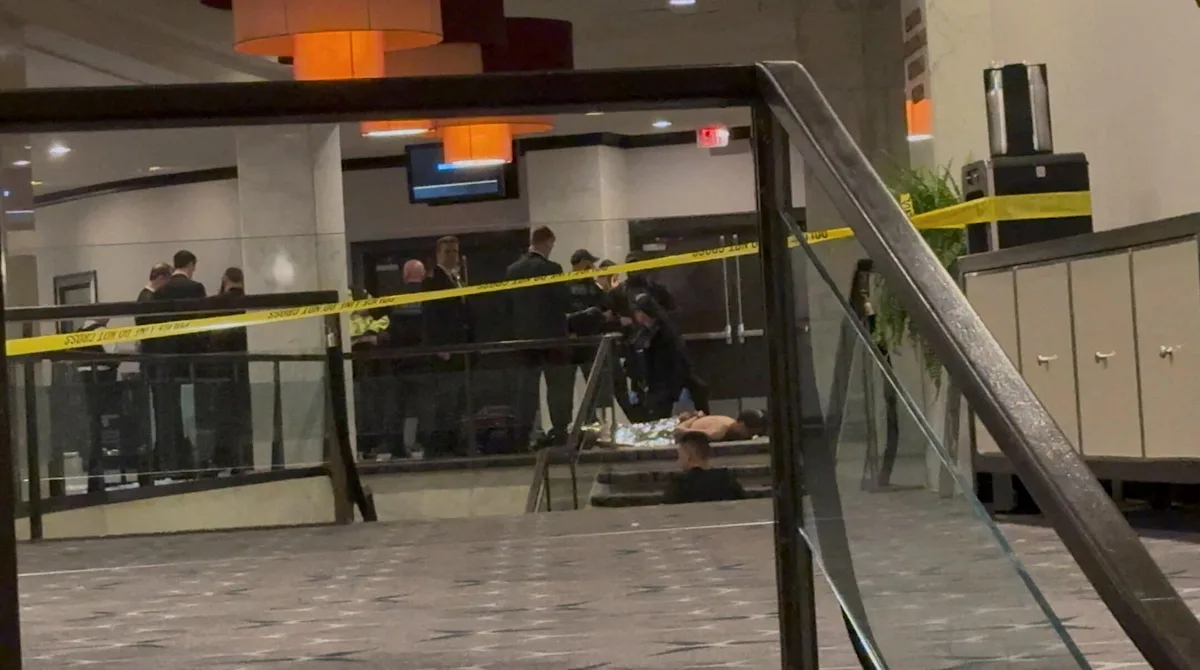 Gunshot at dinner may have struck officer's phone in pocket of bulletproof vest