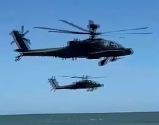 Apache pilots' suspensions lifted after flyby over South Carolina beach