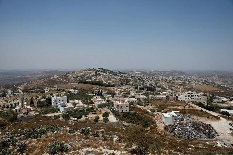 Israeli troops round up Palestinians in West Bank village after shootout involving settlers