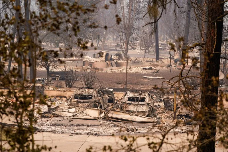 Wildfires near Spokane destroy more than 700 buildings, force 64,000 to flee