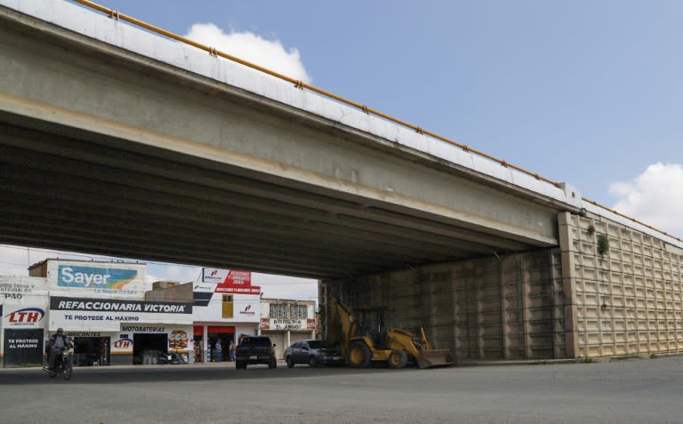 Bodies hanging from bridge revive violence in once-calm town in Mexico