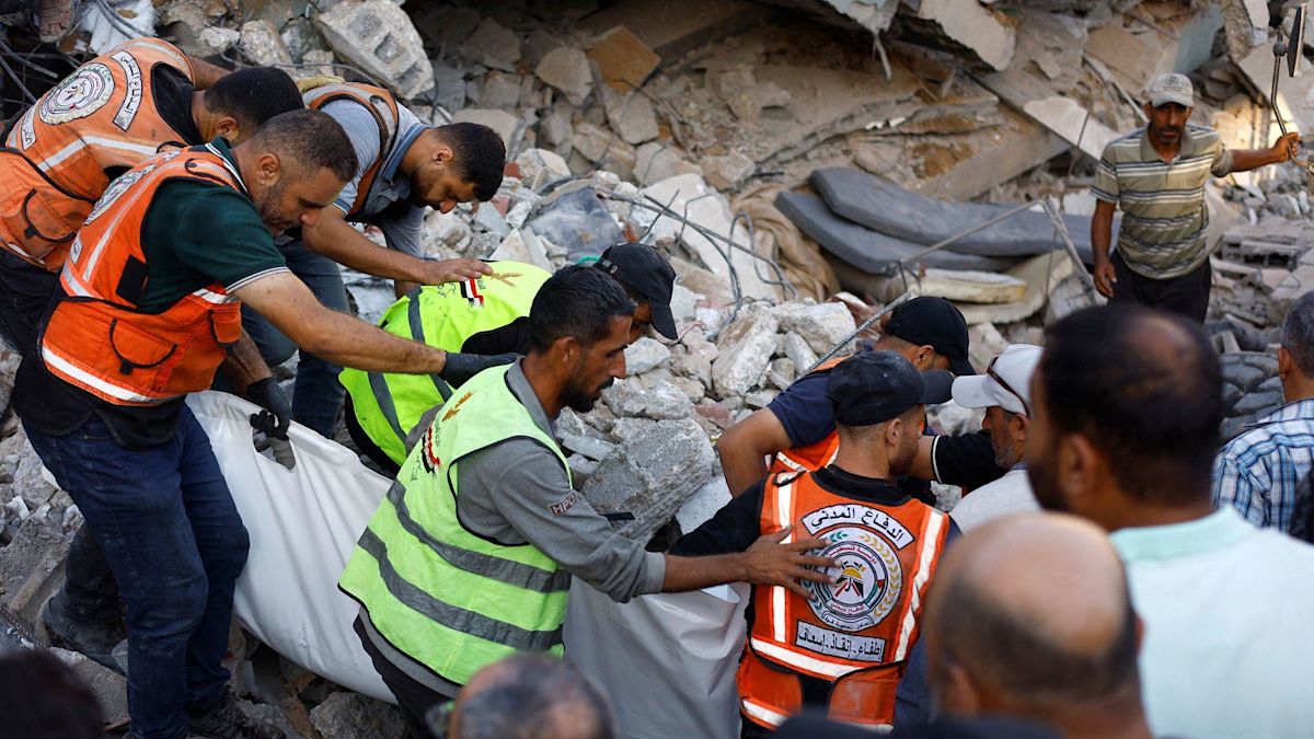 Eight children among 21 killed after war-damaged Gaza building collapses, rescuers say