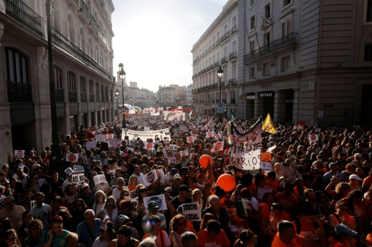 Thousands march in Madrid over eviction of 87-year-old woman