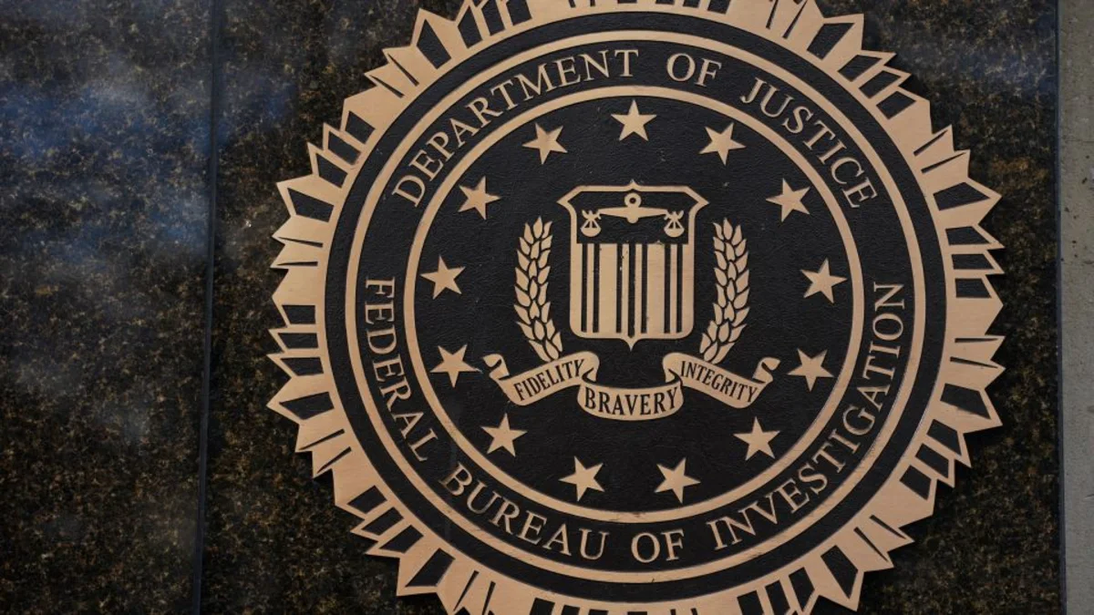 FBI arrests key suspect in major hack of agents’ data