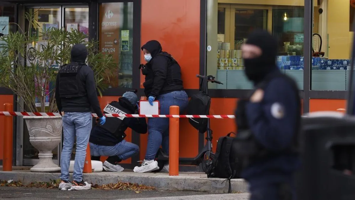 Deadly shooting near Paris is a 'racist terrorist attack', Macron says